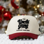 Cap with 'The Uncle Gang Cooler Than Dad' text against a festive background