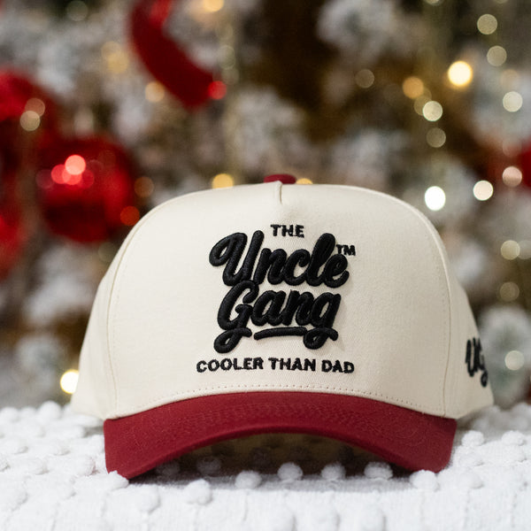 Cap with 'The Uncle Gang Cooler Than Dad' text against a festive background